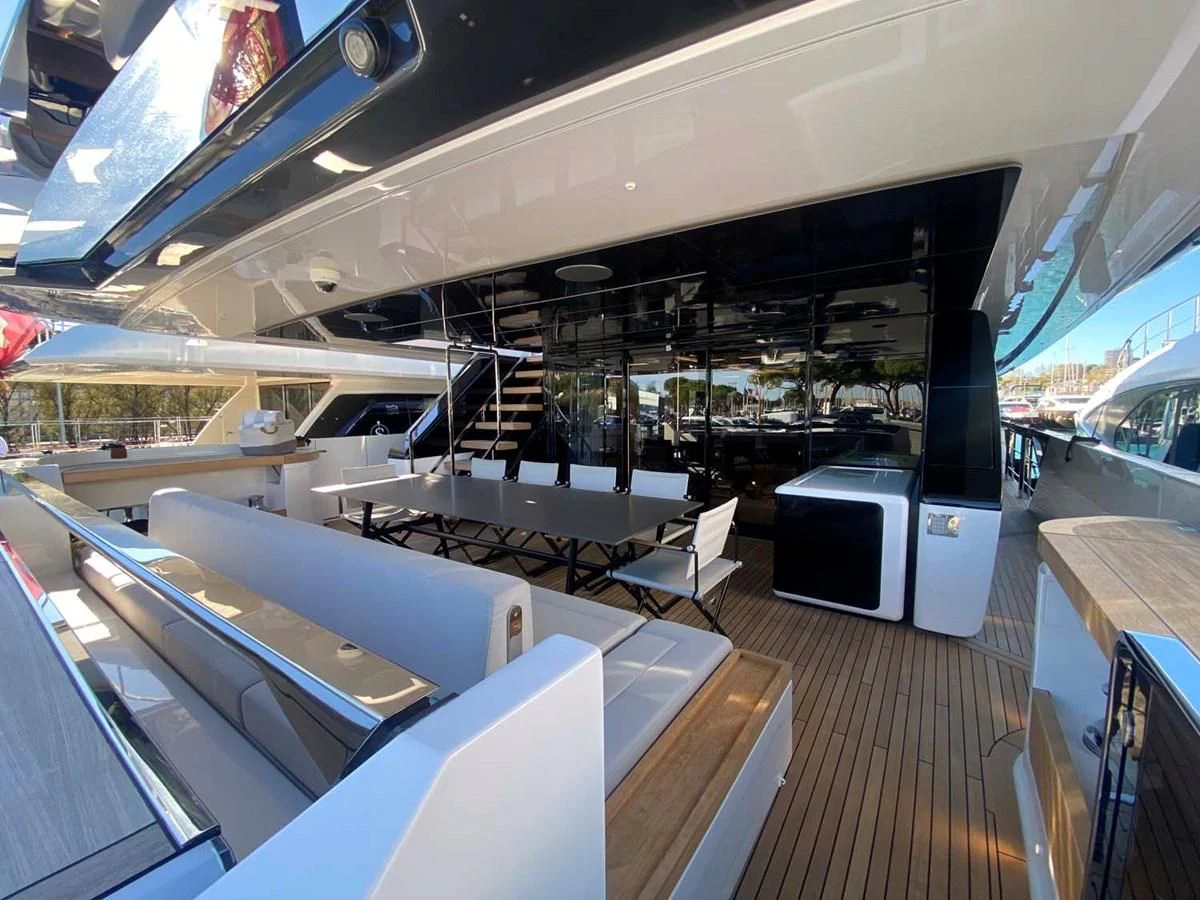 a room with a large deck and a pool table aboard AMORES Yacht for Sale