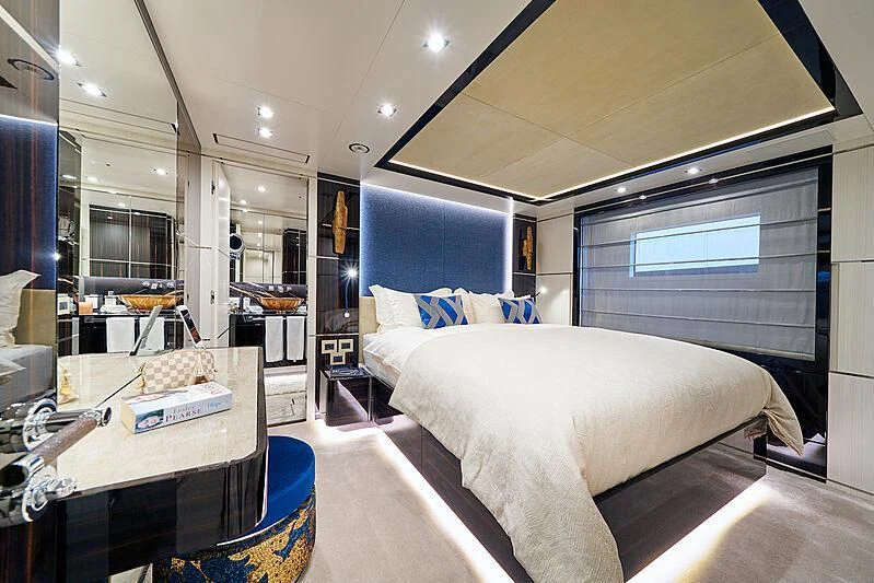 a room with a couple of beds aboard HAPPY ME Yacht for Charter