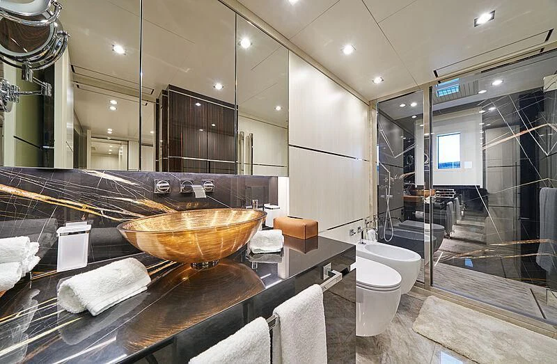 a bathroom with a sink and a toilet aboard HAPPY ME Yacht for Charter