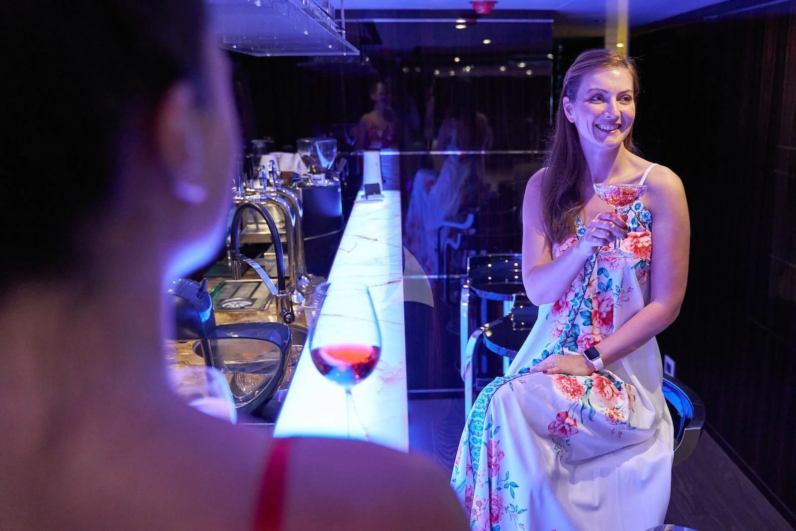 a woman smiling at a man aboard HAPPY ME Yacht for Charter