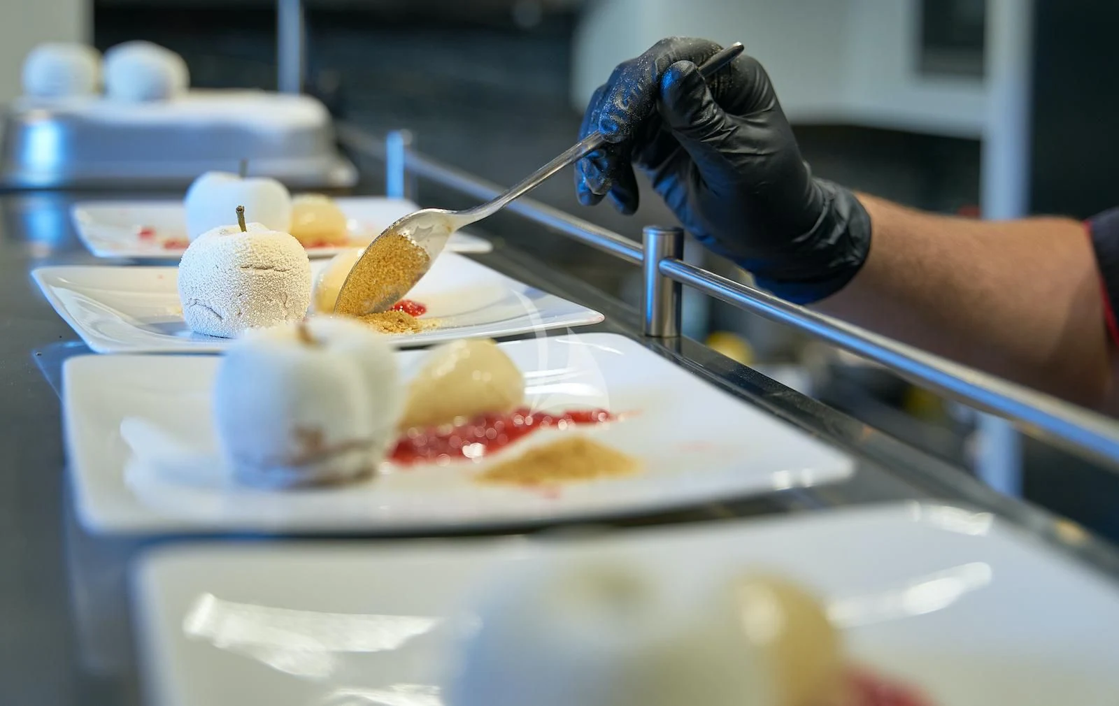 a person slicing a sandwich aboard HAPPY ME Yacht for Charter