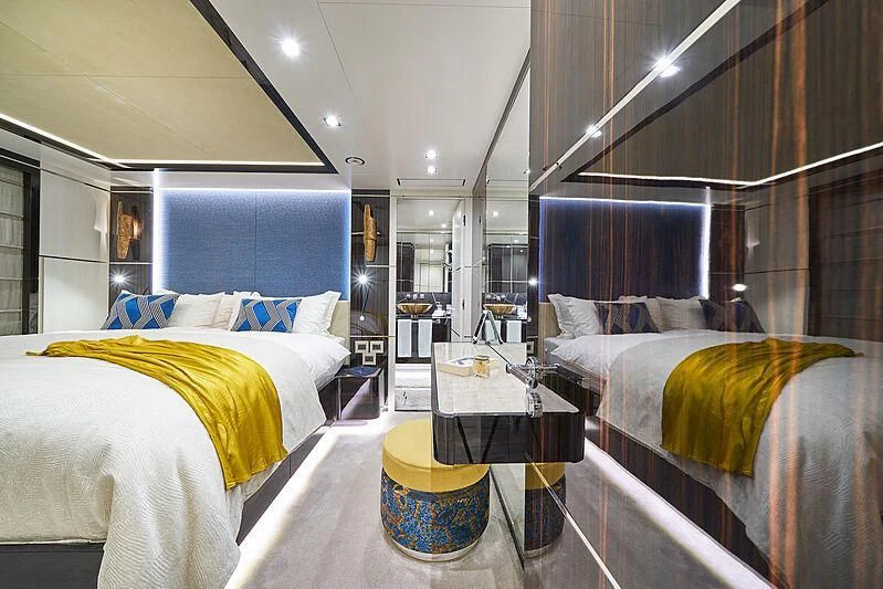 a couple of beds in a room aboard HAPPY ME Yacht for Charter