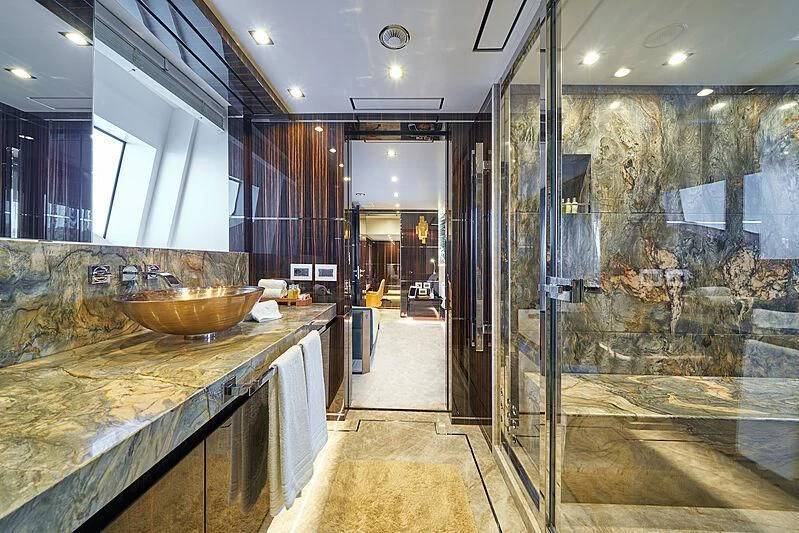a kitchen with marble counter tops aboard HAPPY ME Yacht for Charter
