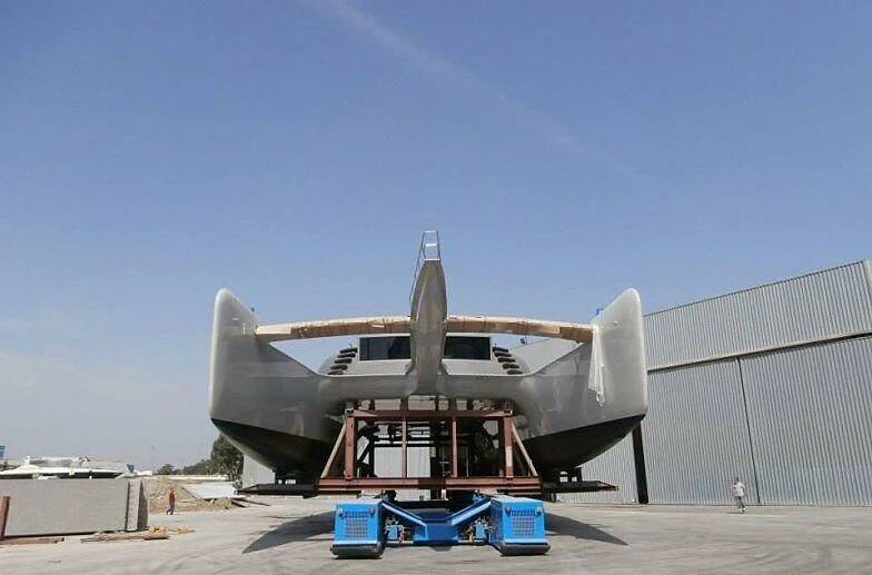 a large metal object with a person standing next to it aboard LYFE AT SEA Yacht for Sale