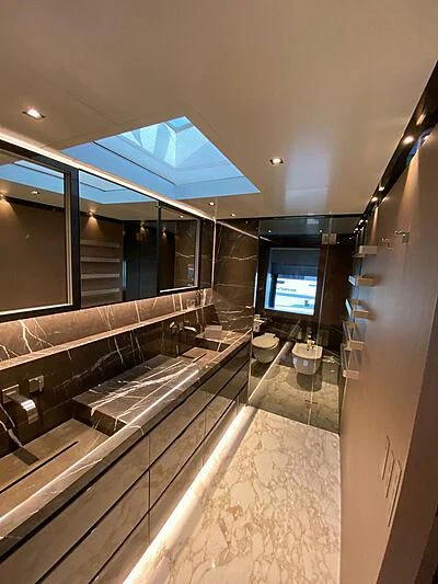 a large room with a large glass window aboard PANAM Yacht for Sale