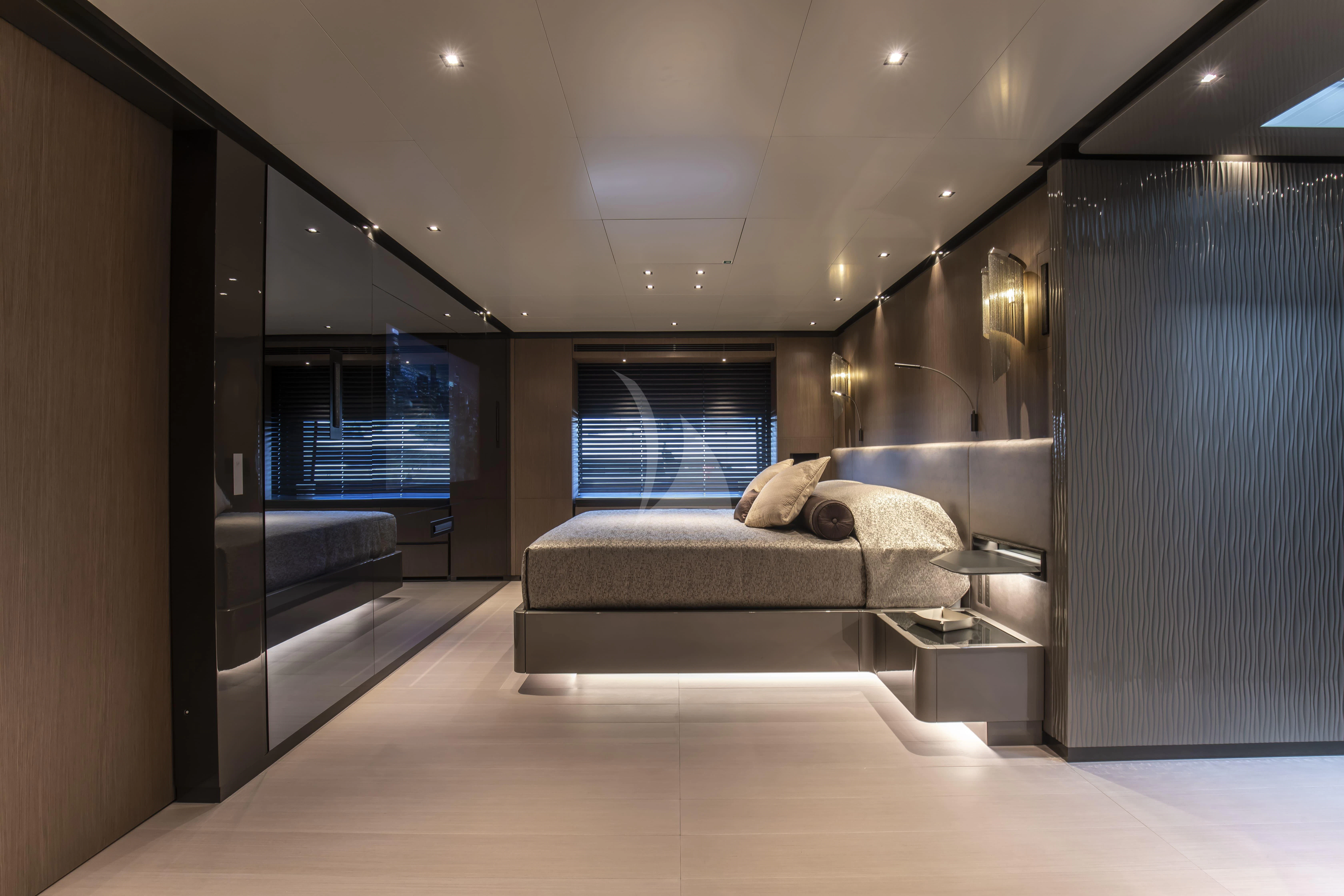 a room with a couch and a table aboard PANAM Yacht for Sale