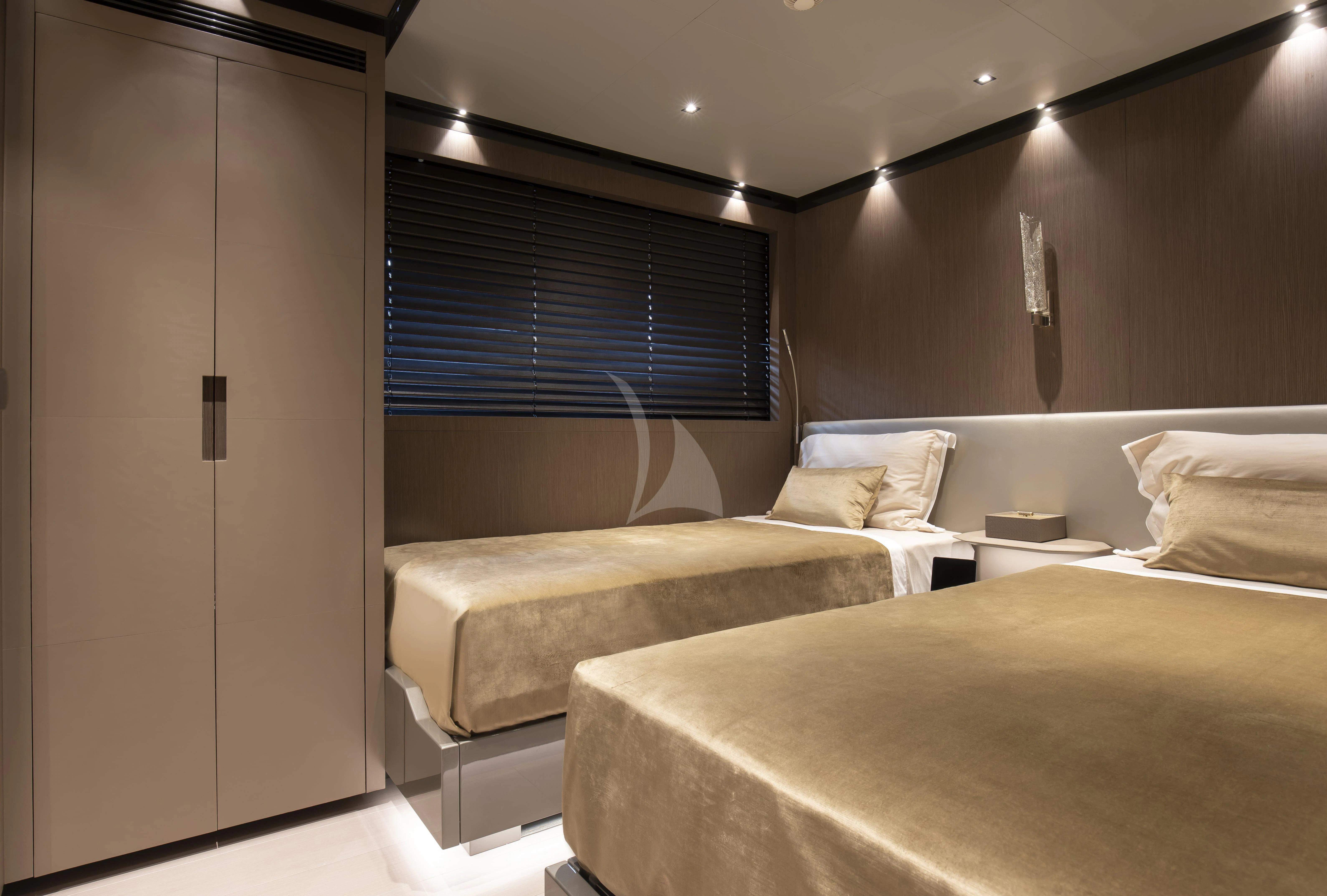 a room with two beds aboard PANAM Yacht for Sale