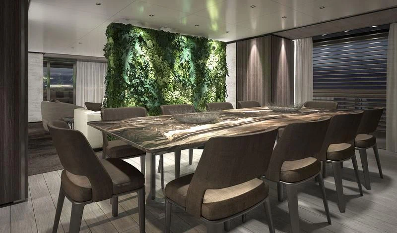 a large table with chairs around it aboard PANAM Yacht for Sale