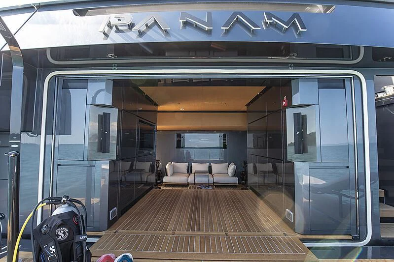 a train with chairs and a bench aboard PANAM Yacht for Sale