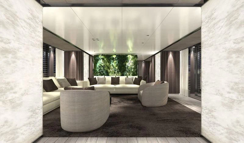 a room with couches and a table aboard PANAM Yacht for Sale