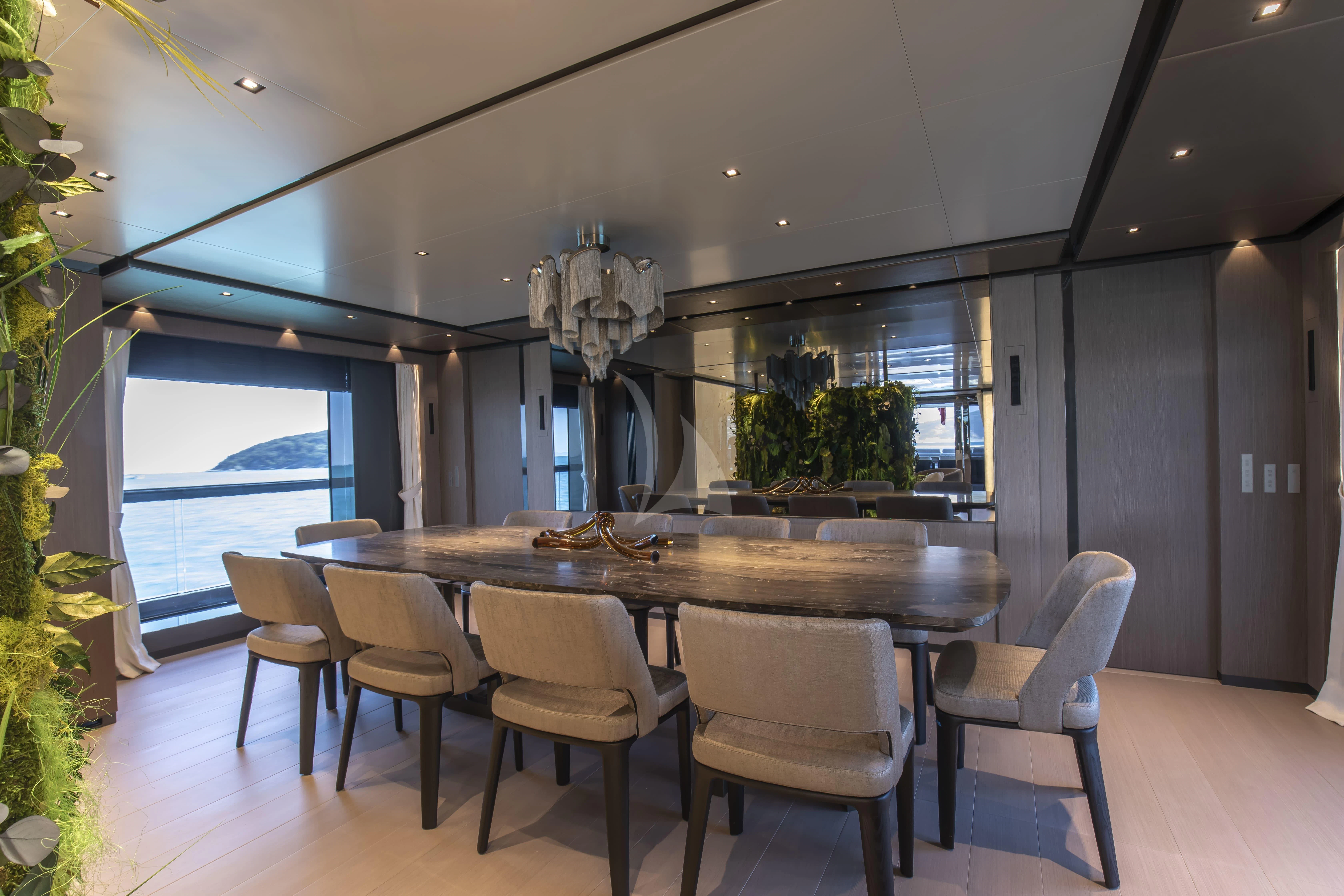 a large kitchen with a large island aboard PANAM Yacht for Sale