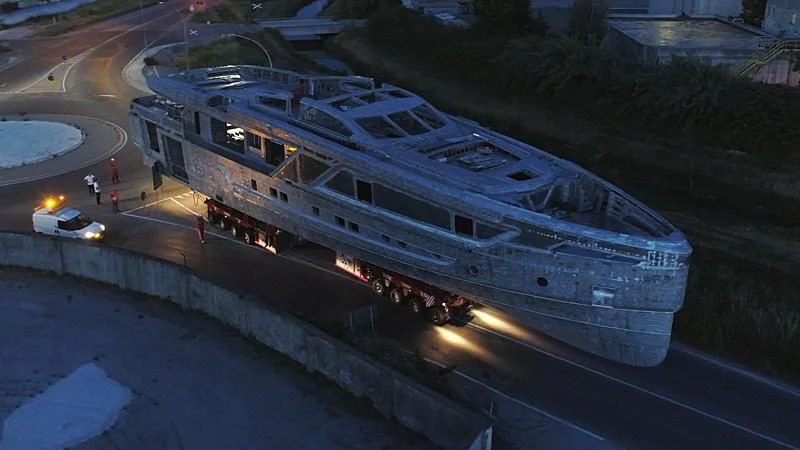 a large ship on a road aboard PANAM Yacht for Sale