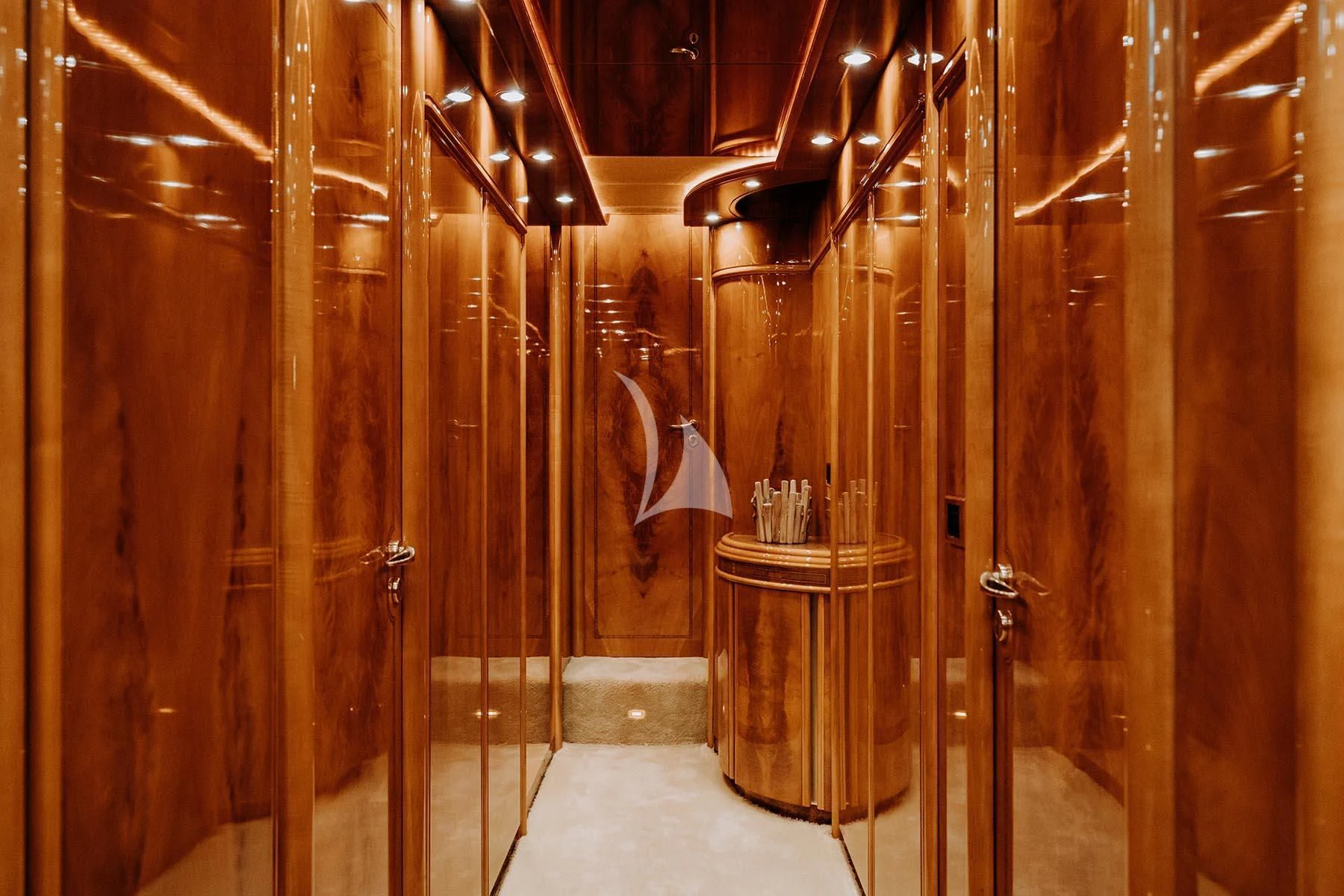 a room with wooden walls aboard SONRISA SEPTIMO Yacht for Sale