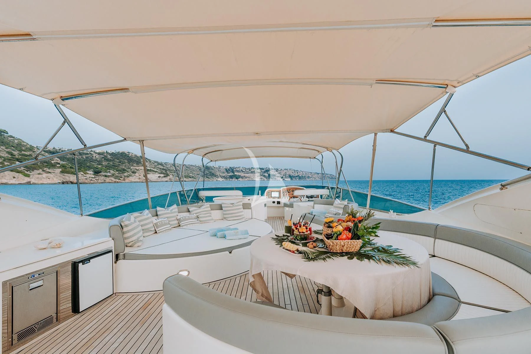 a room with a table and chairs on a boat aboard SONRISA SEPTIMO Yacht for Sale