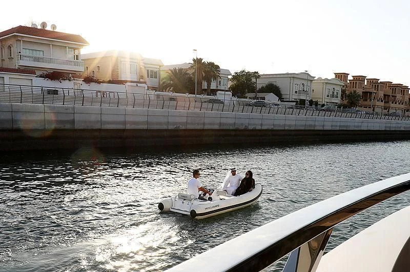 a group of people in a boat aboard MAXIMUS Yacht for Sale