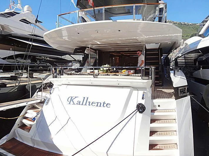 a boat with a staircase and a person standing on the deck aboard MAXIMUS Yacht for Sale