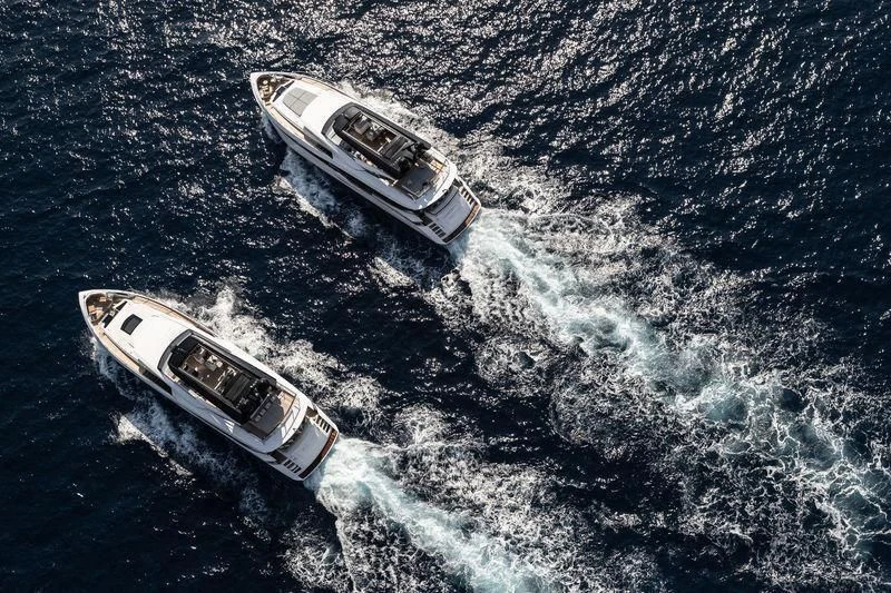 a high angle view of a car driving on a road aboard MAXIMUS Yacht for Sale