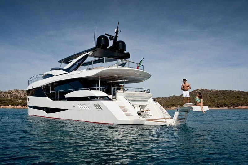 a couple people on a boat aboard MAXIMUS Yacht for Sale