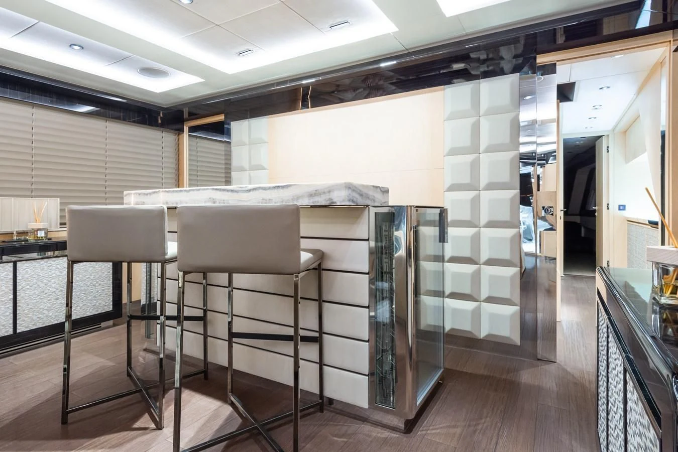 a room with a table and chairs aboard MAXIMUS Yacht for Sale