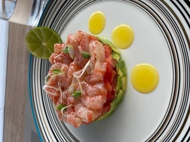 a plate of food aboard MAXIMUS Yacht for Sale