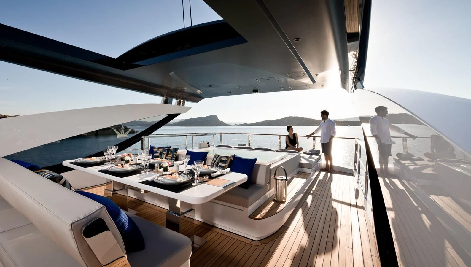 a boat with a table and chairs on it aboard MAXIMUS Yacht for Sale