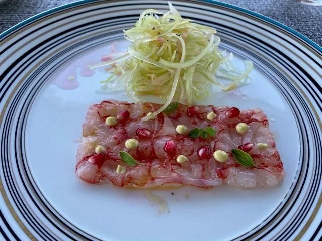 a plate of food aboard MAXIMUS Yacht for Sale