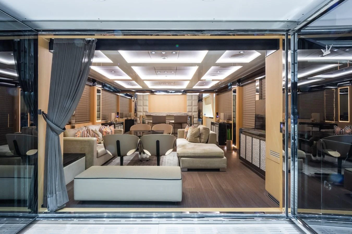 a room with a couch and a table aboard MAXIMUS Yacht for Sale