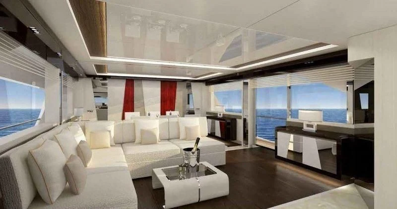 a room with a couch and a table aboard MAXIMUS Yacht for Sale