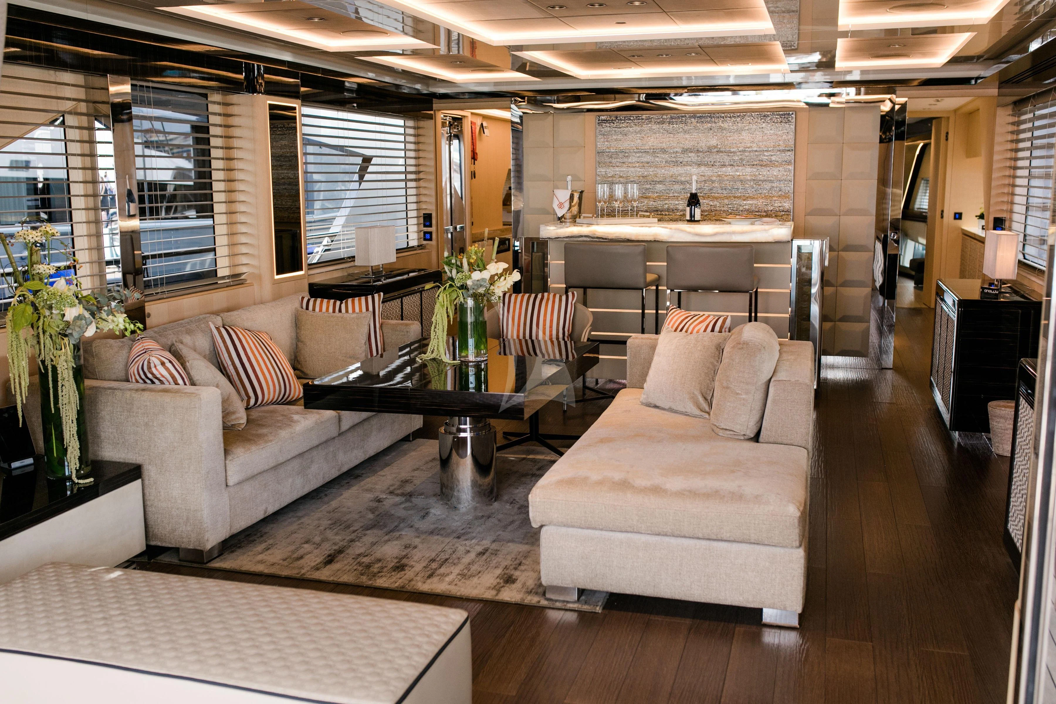 a living room with a couch and a table aboard MAXIMUS Yacht for Sale