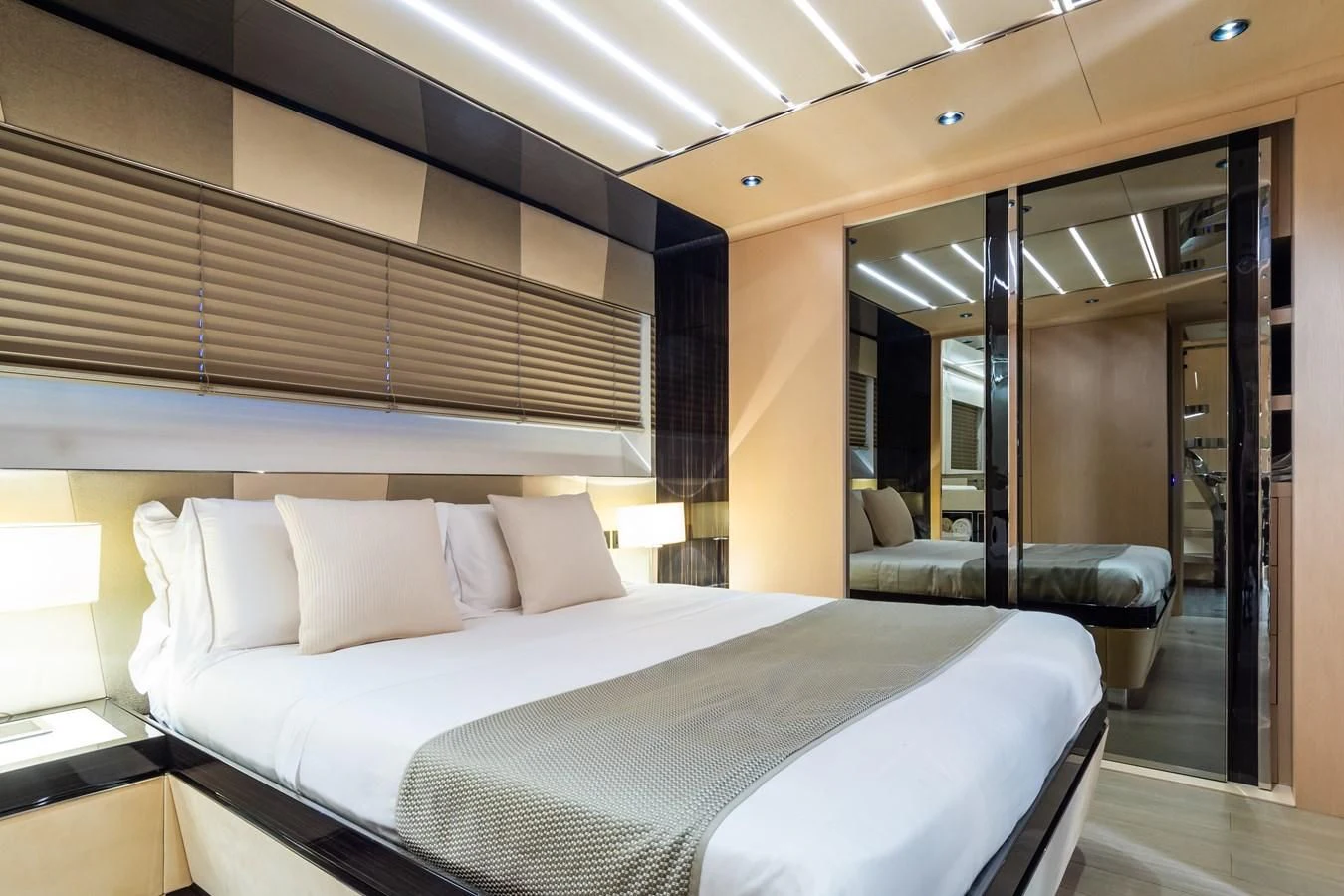 a bed in a room aboard MAXIMUS Yacht for Sale