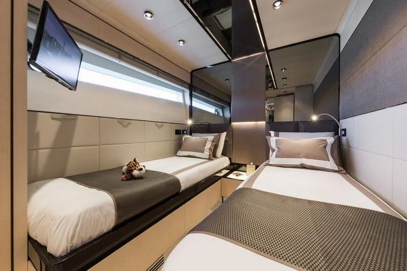 a room with two beds aboard MAXIMUS Yacht for Sale