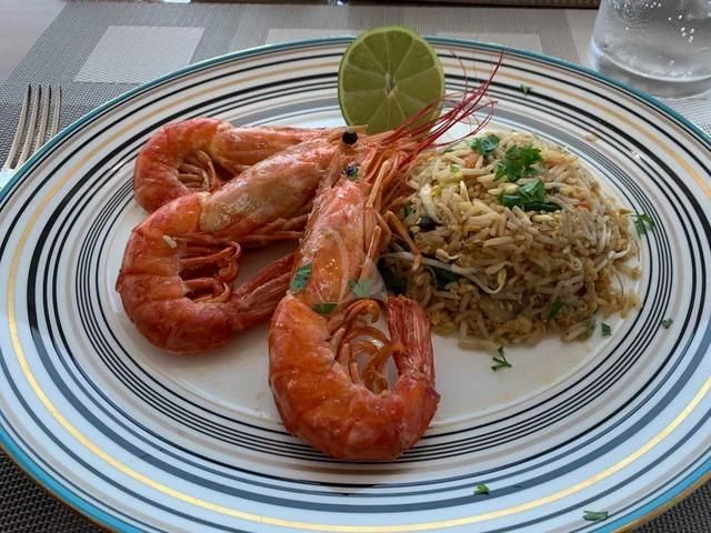 a plate of food aboard MAXIMUS Yacht for Sale