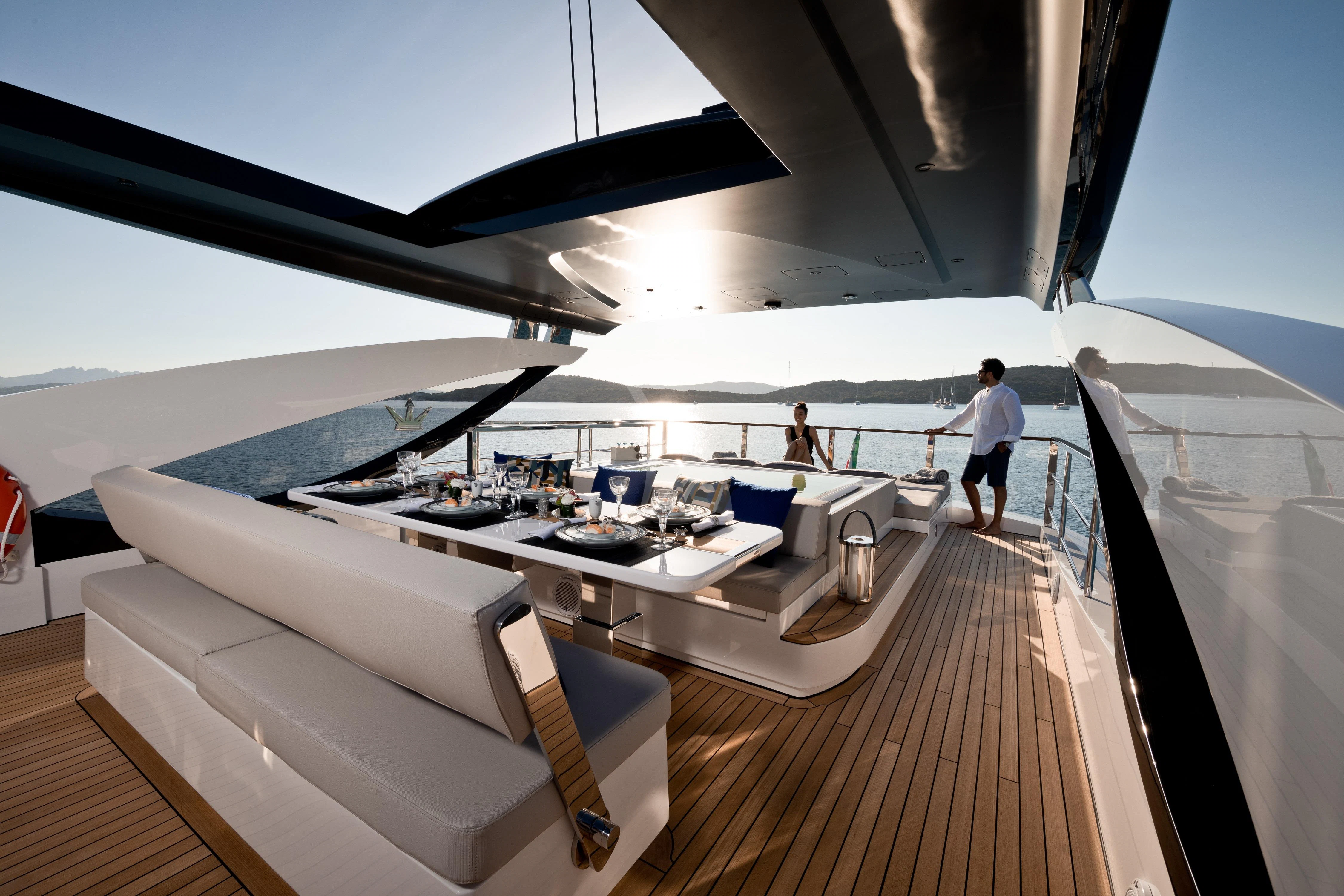 a person walking on a deck aboard MAXIMUS Yacht for Sale