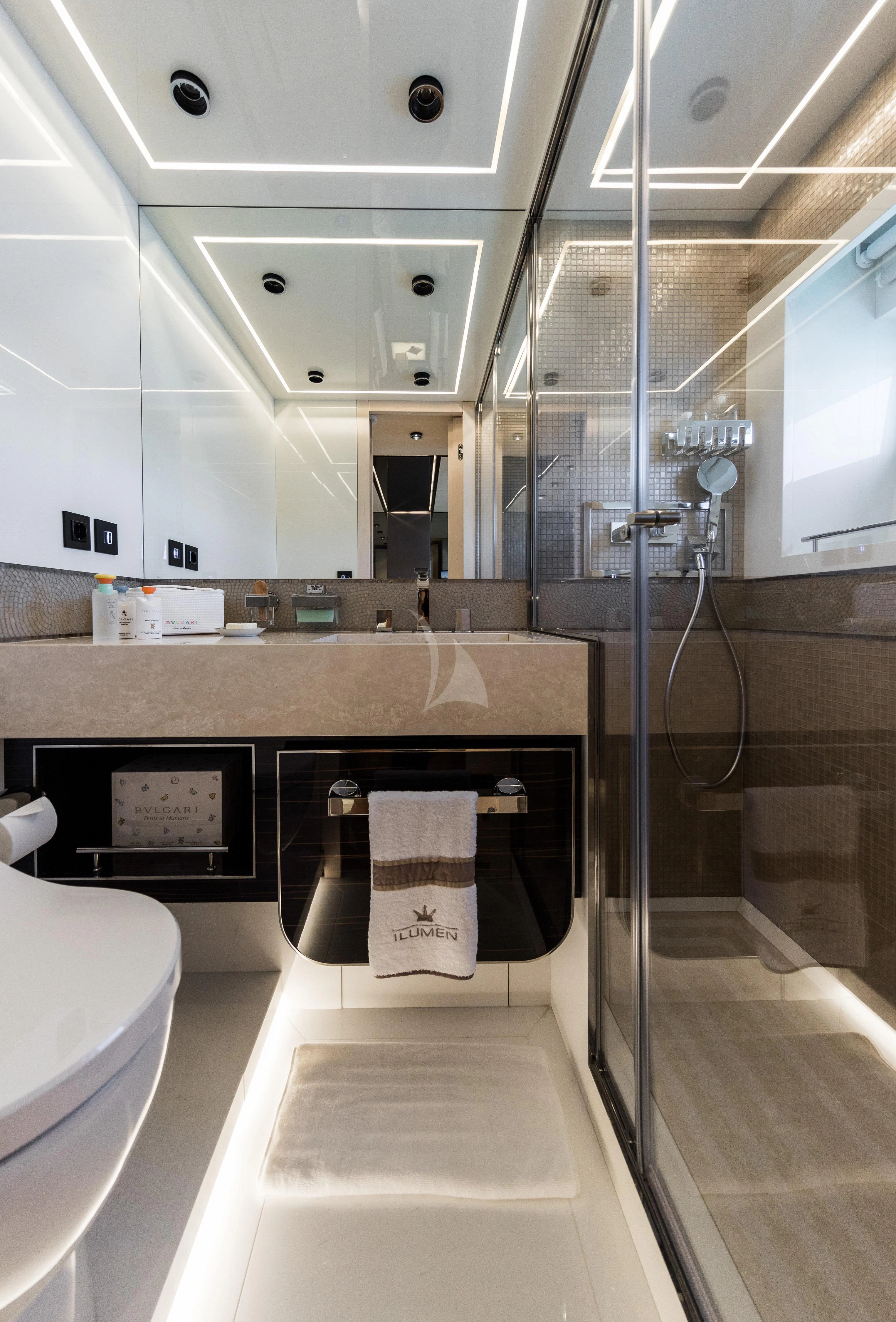 a bathroom with a shower unit and sink aboard MAXIMUS Yacht for Sale