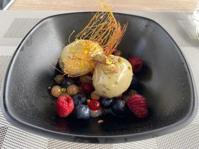 a plate of food aboard MAXIMUS Yacht for Sale