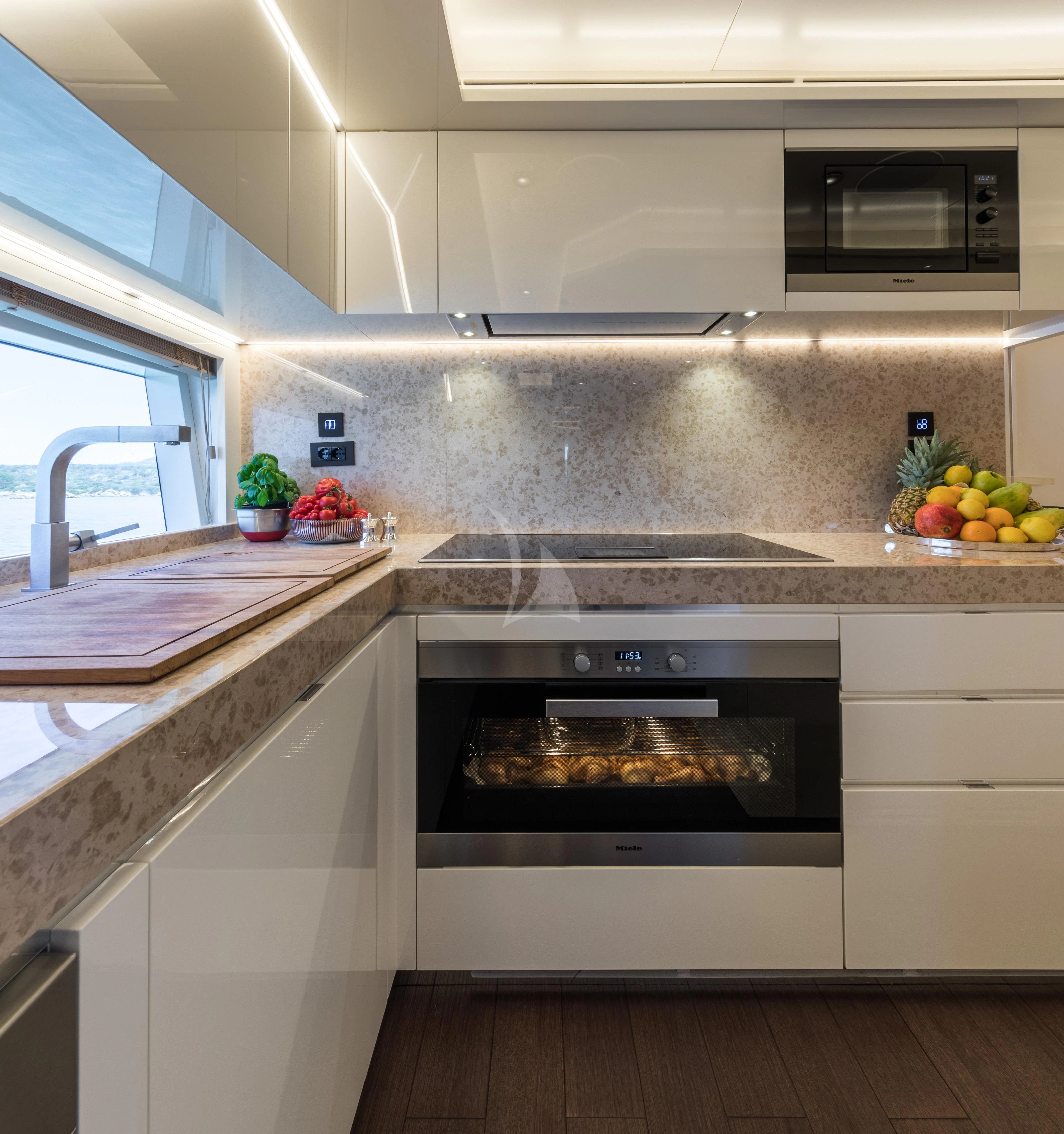 a kitchen with a stove and oven aboard MAXIMUS Yacht for Sale