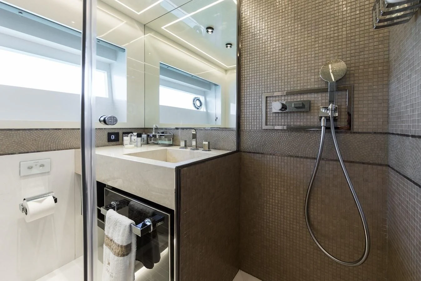 a bathroom with a sink and a mirror aboard MAXIMUS Yacht for Sale