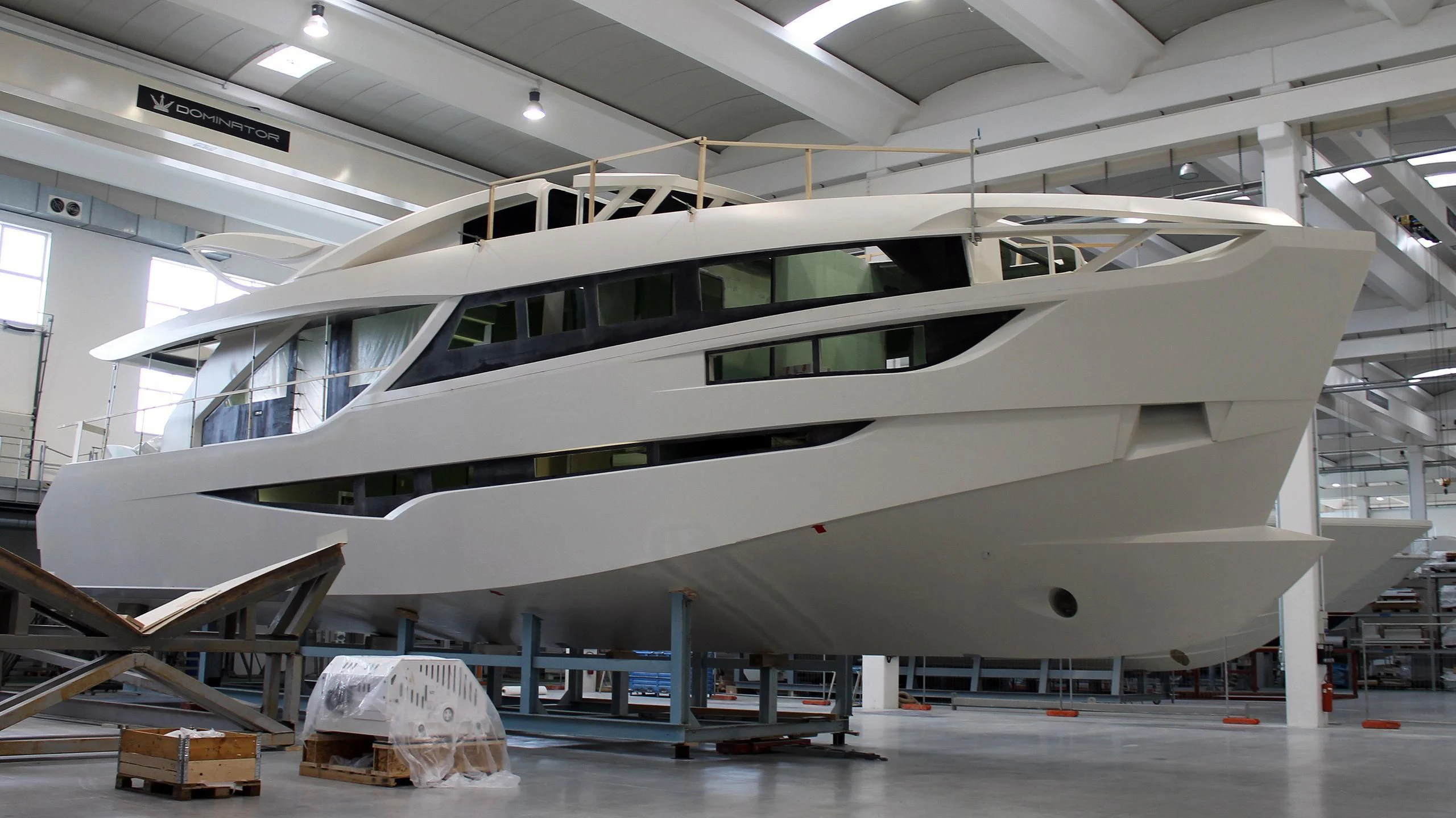 a large white yacht in a building aboard MAXIMUS Yacht for Sale