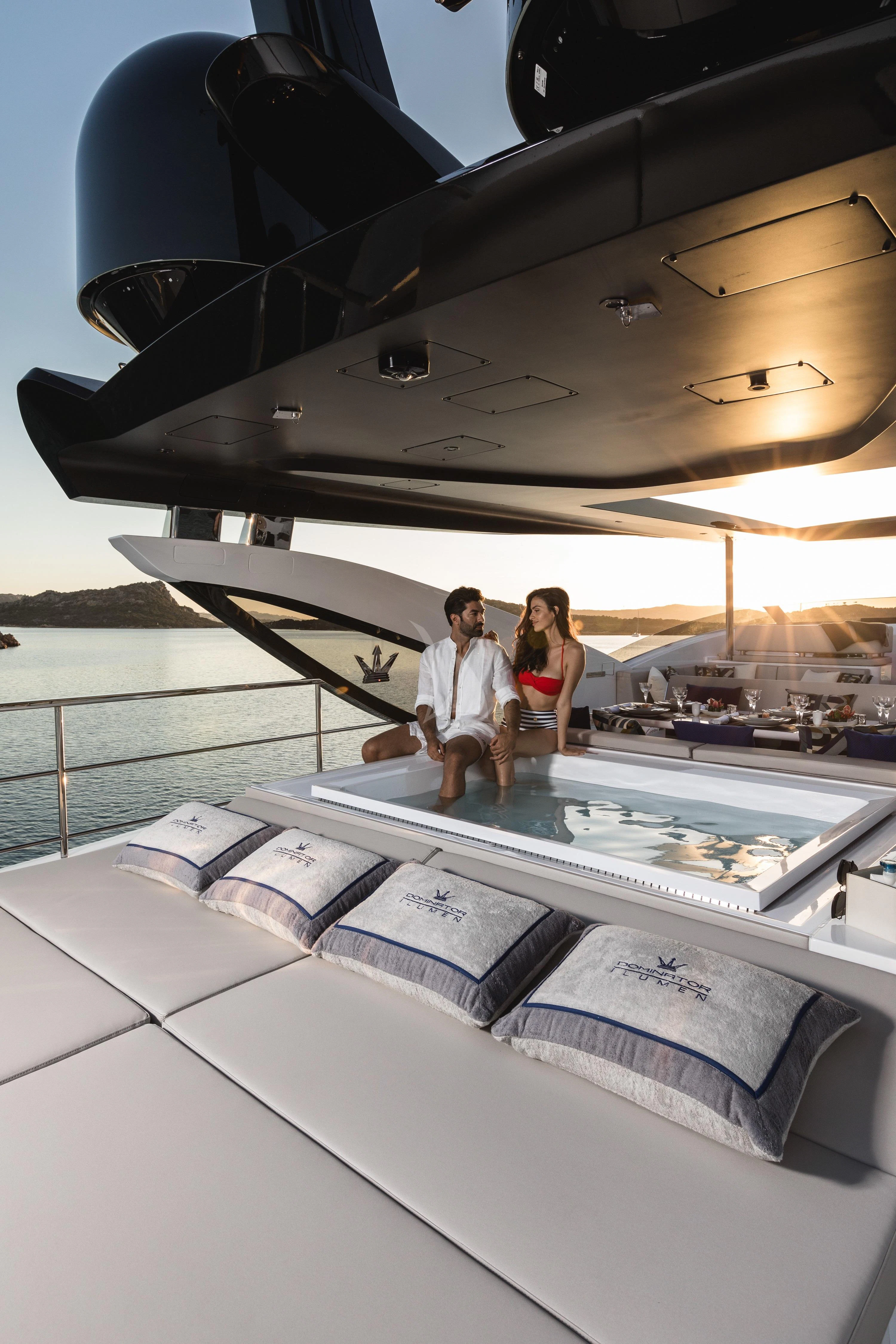 a couple standing on a boat aboard MAXIMUS Yacht for Sale