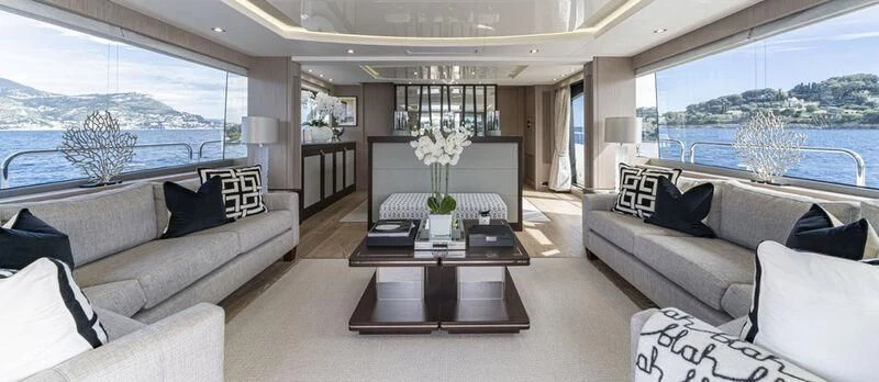 a living room with a large window aboard TORO Yacht for Sale