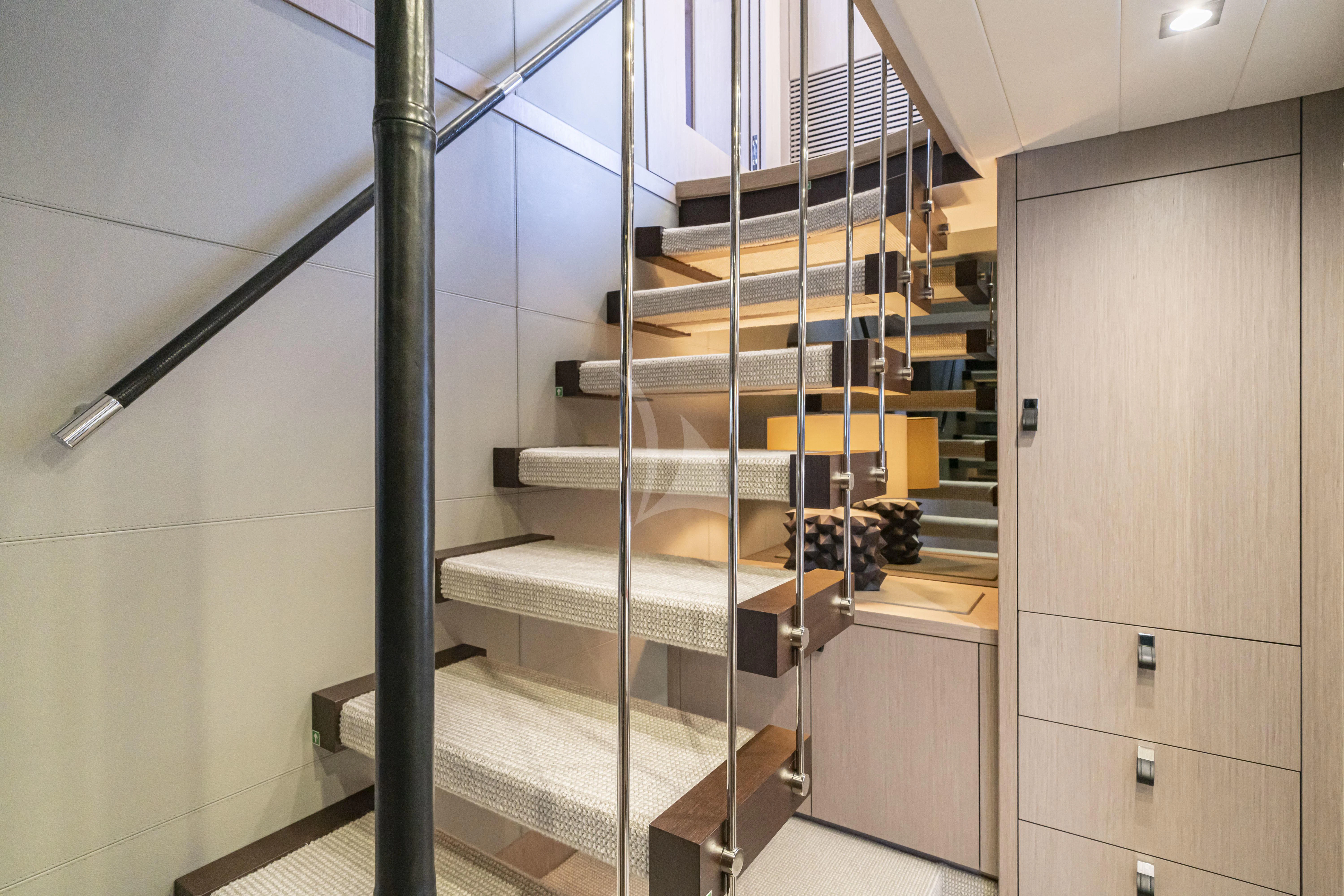 a set of bunk beds in a room aboard TORO Yacht for Sale