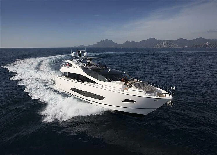a white boat on the water aboard TORO Yacht for Sale