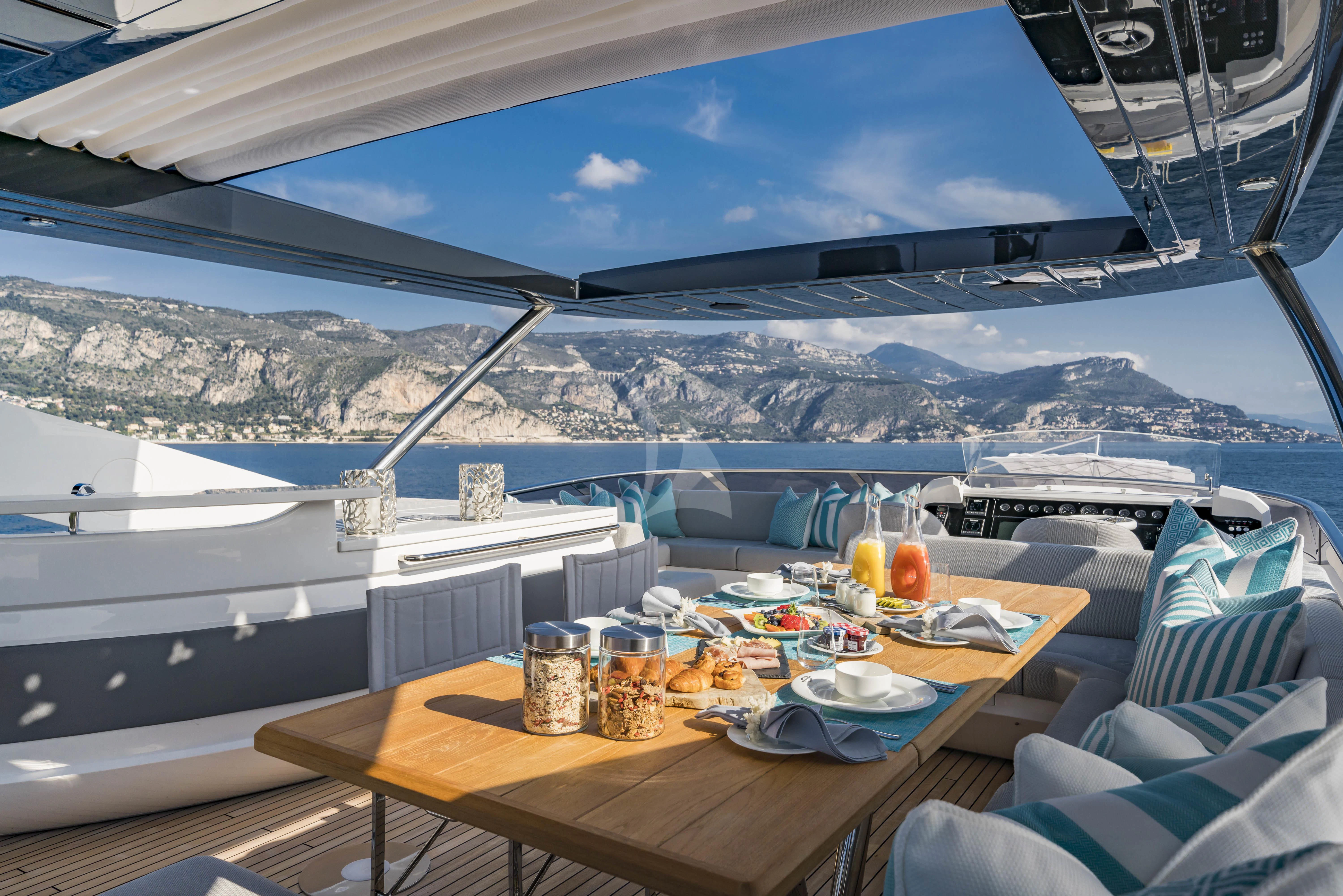 a table with food on it aboard TORO Yacht for Sale