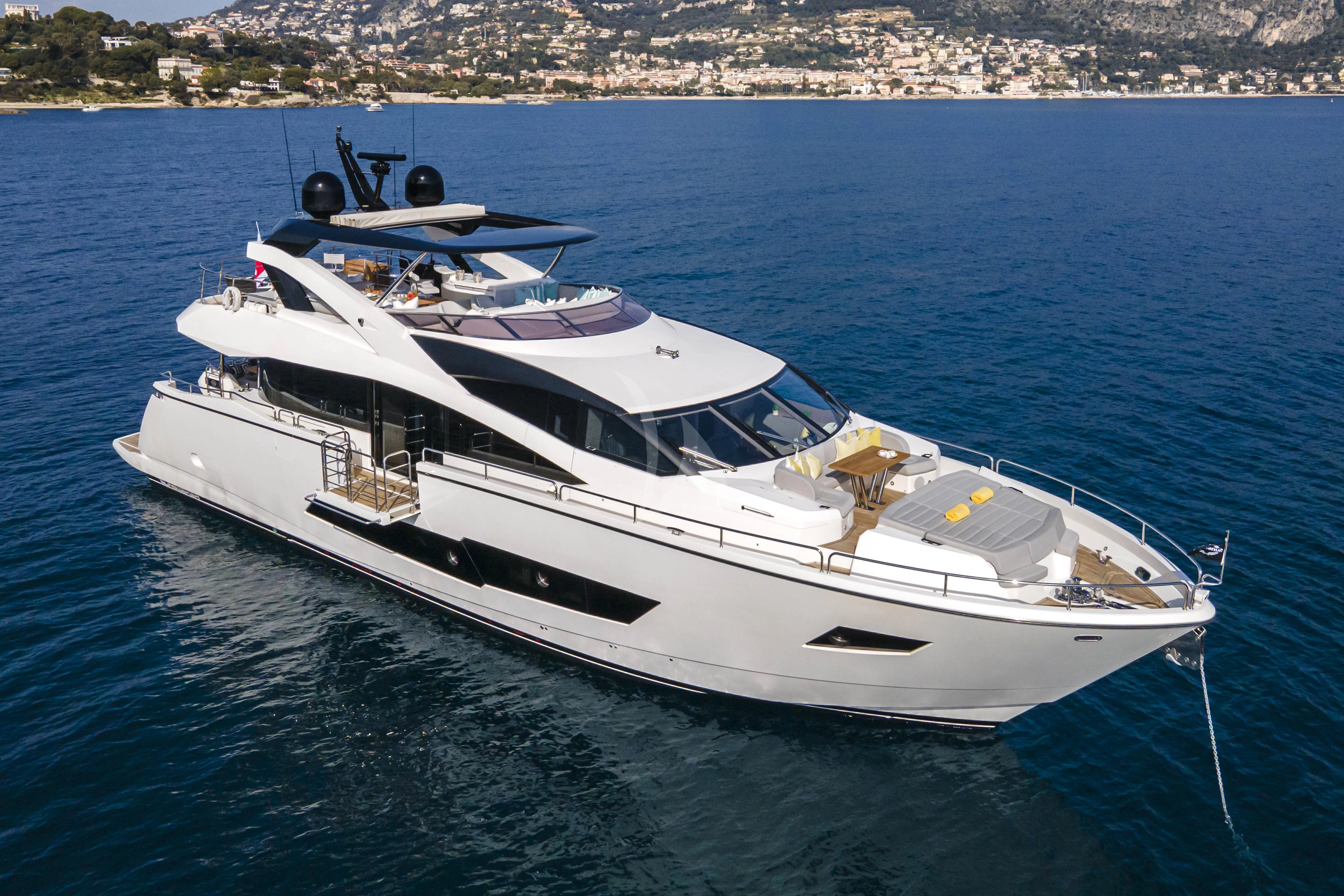 a white yacht on the water aboard TORO Yacht for Sale
