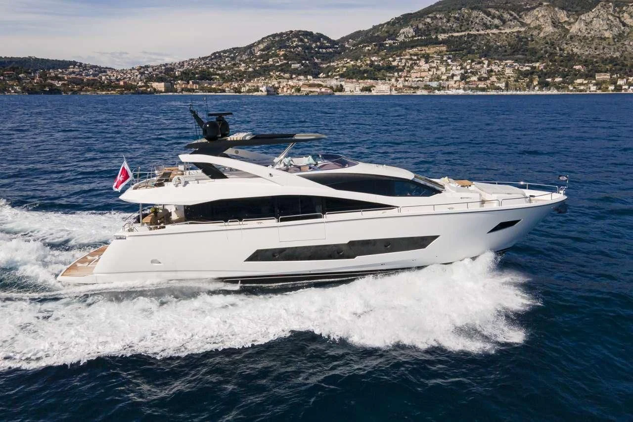 a white yacht on the water aboard TORO Yacht for Sale