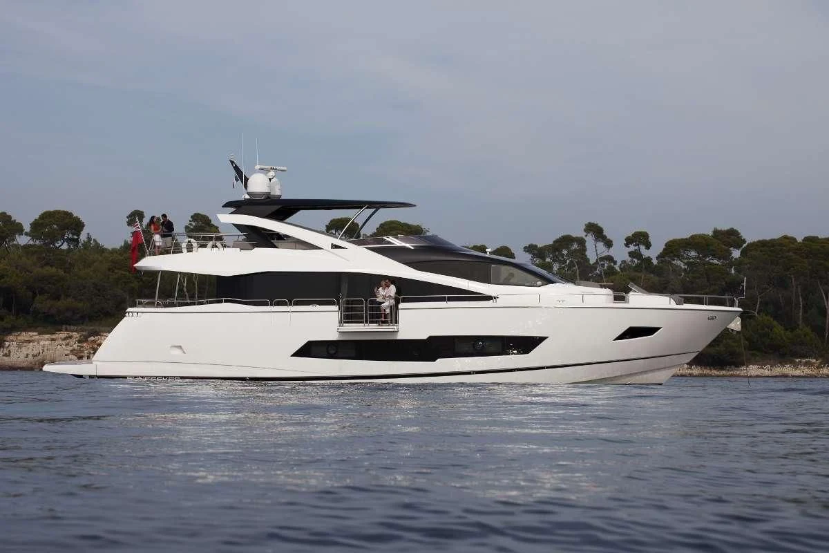 a white yacht on the water aboard TORO Yacht for Sale