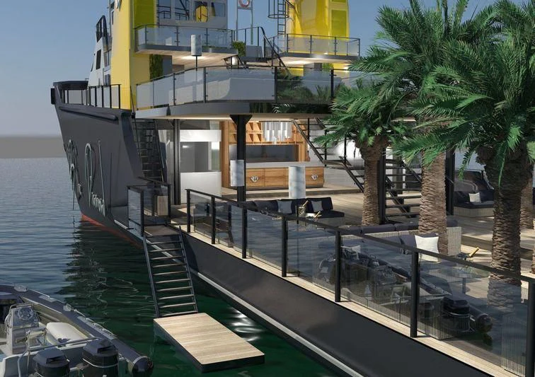 a boat dock with a dock and palm trees aboard AFTHONIA V Yacht for Sale
