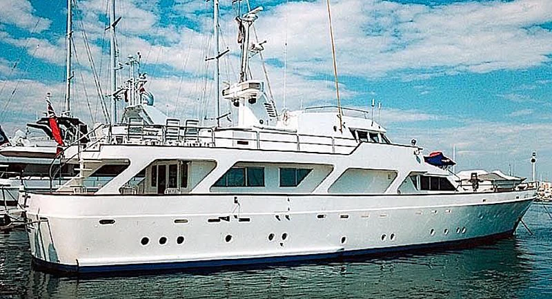 a large white yacht aboard NOMAD Yacht for Sale