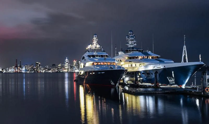 a couple of large ships on the water aboard ATTESSA Yacht for Sale