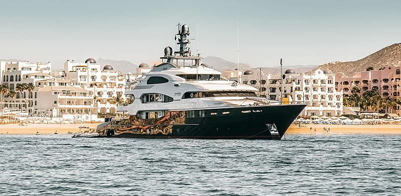 a large ship in the water aboard ATTESSA Yacht for Sale